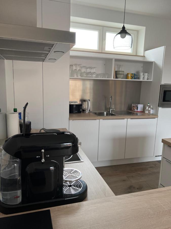 Les Duplex De La Place Des Ecoles Спа Екстериор снимка